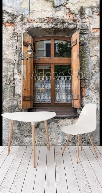 Picture of Old window on ancient wall